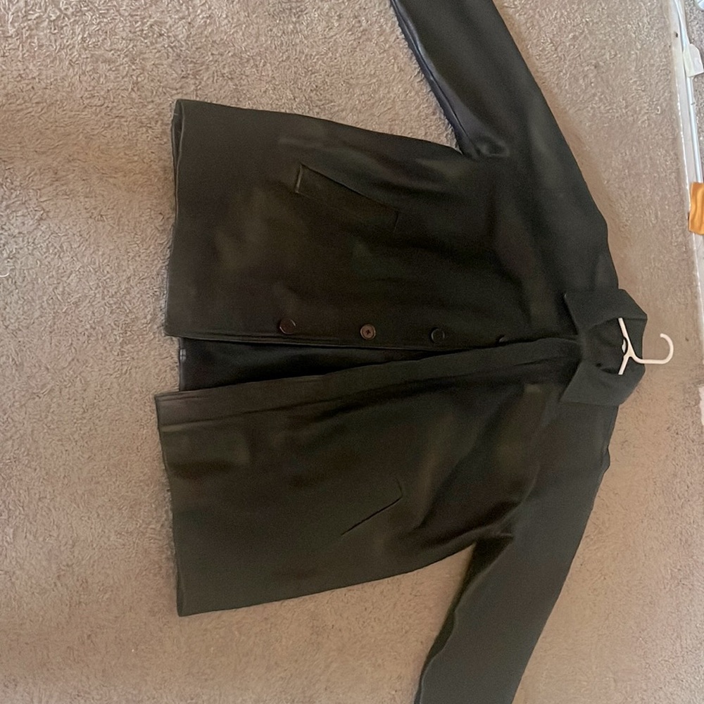 Black leatherjacket. Interior pockets and all buttons in great condition